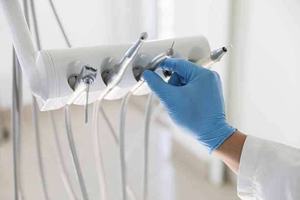 Professional Tooth Extraction technician working in Rockford, MI
